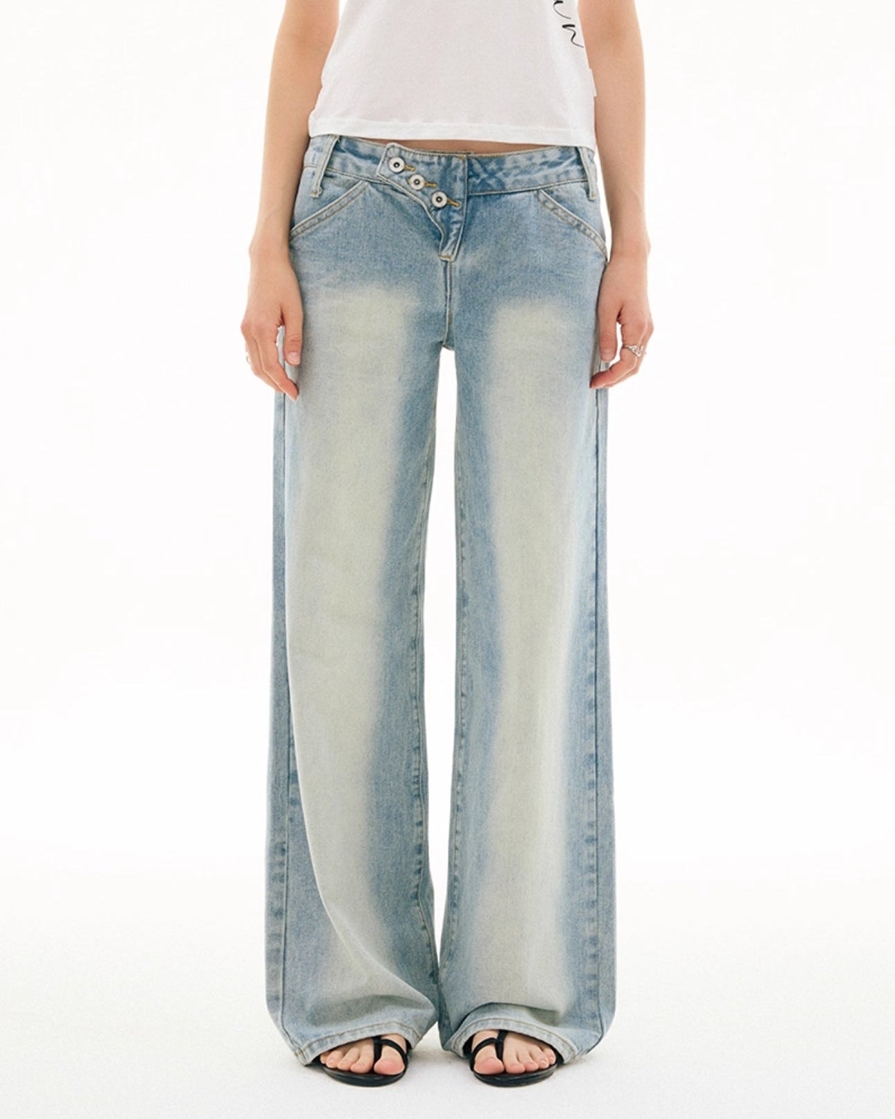 SLANT BREASTED LOW RISE JEANS