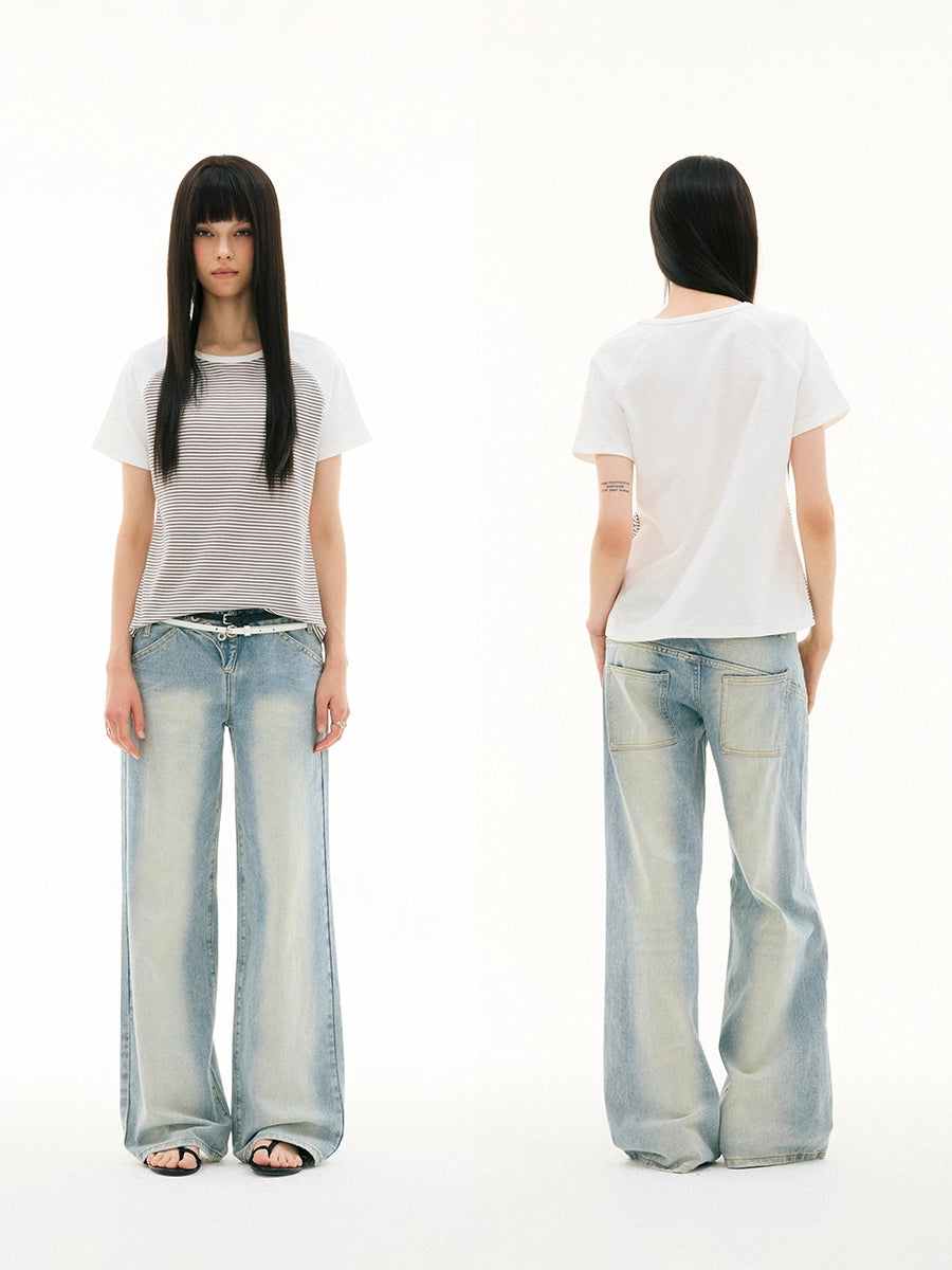 SLANT BREASTED LOW RISE JEANS