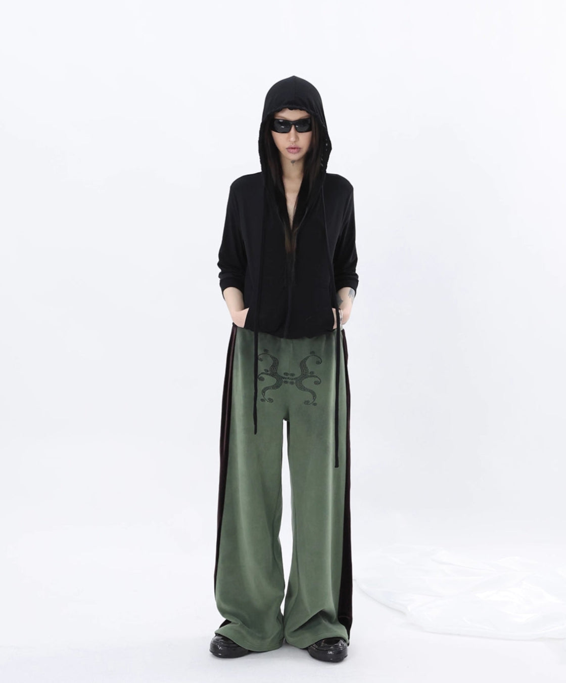 DISTRESSED TOTEM PATCHWORK SWEATPANTS