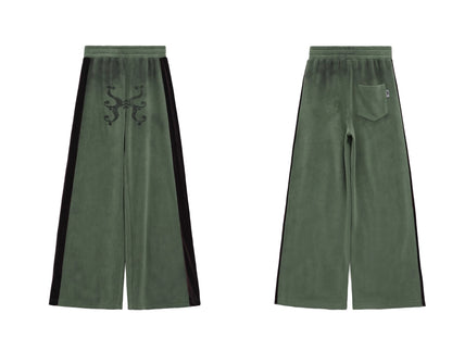 DISTRESSED TOTEM PATCHWORK SWEATPANTS