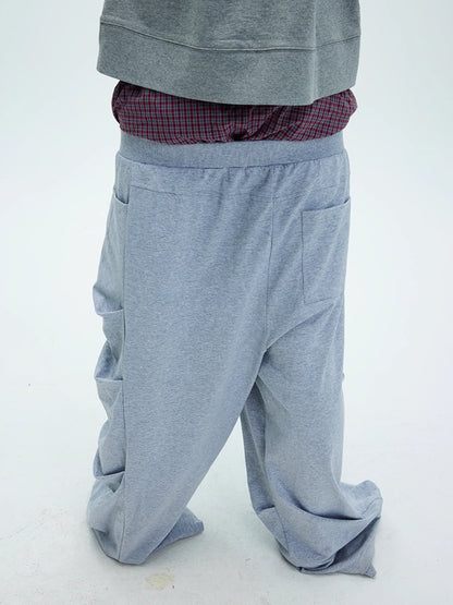 ASYMMETRIC DRAPE BAGGY SWEATPANTS