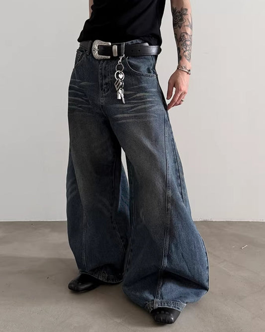 DISTORTED CUT WIDE JEANS