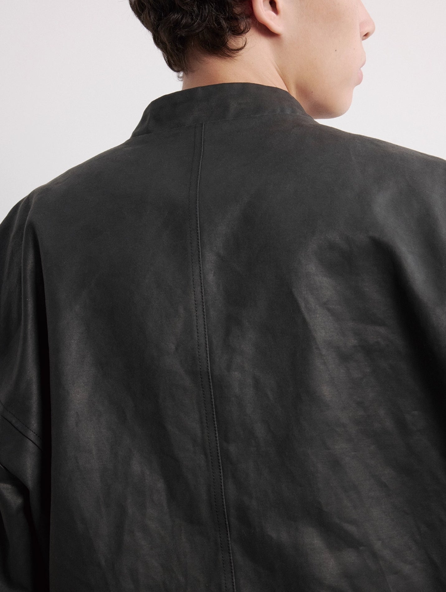 WAXY STIFF SPLIT-HEM COAT