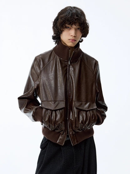 SMOCKED HEM OILED LEATHER JACKET