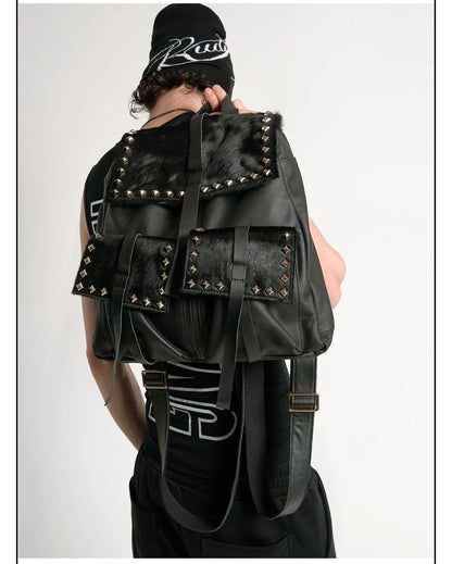 STUDDED HORSEHAIR LEATHER BACKPACK
