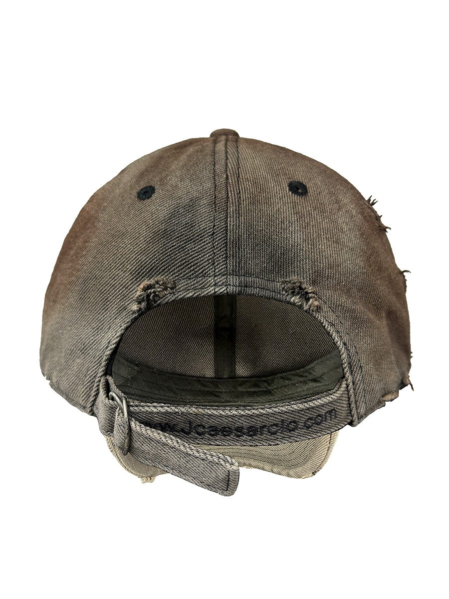 PEAKED RUST DIRTY CAP