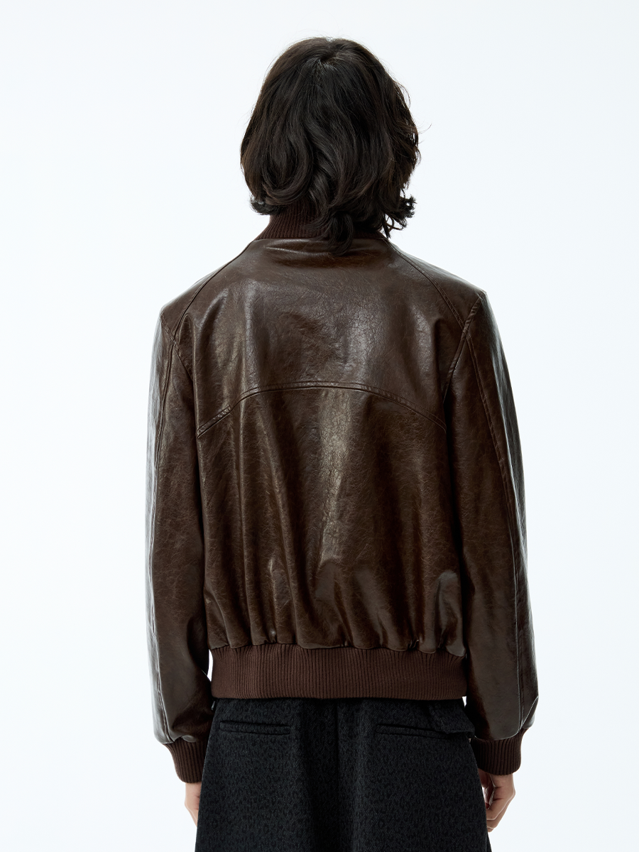 SMOCKED HEM OILED LEATHER JACKET