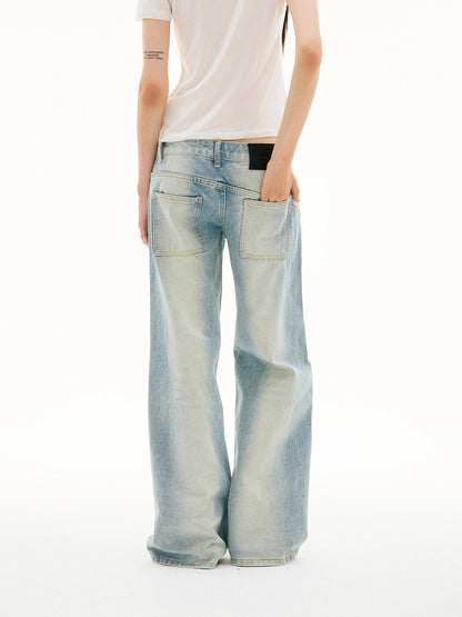 SLANT BREASTED LOW RISE JEANS