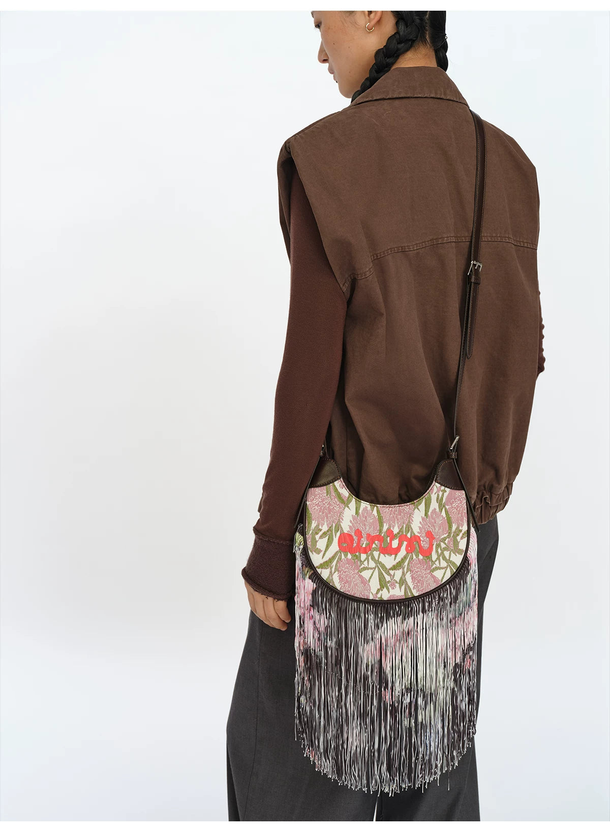 JACQUARD TASSEL MINI SADDLE BAG