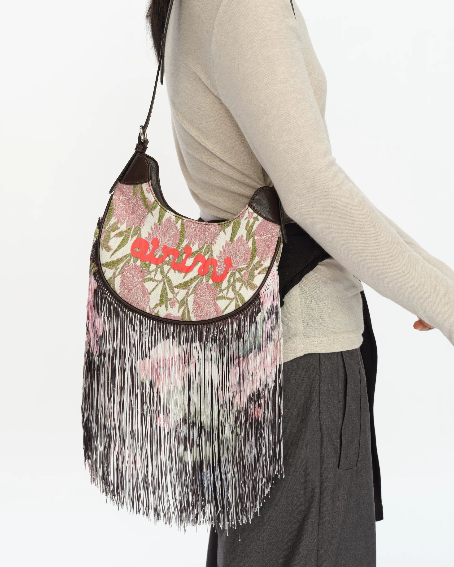 JACQUARD TASSEL MINI SADDLE BAG