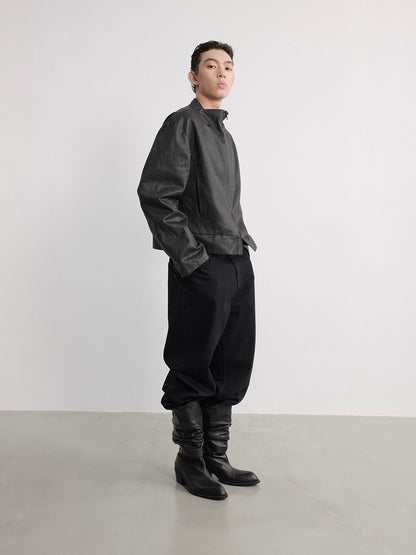 WAXY STIFF SPLIT-HEM COAT