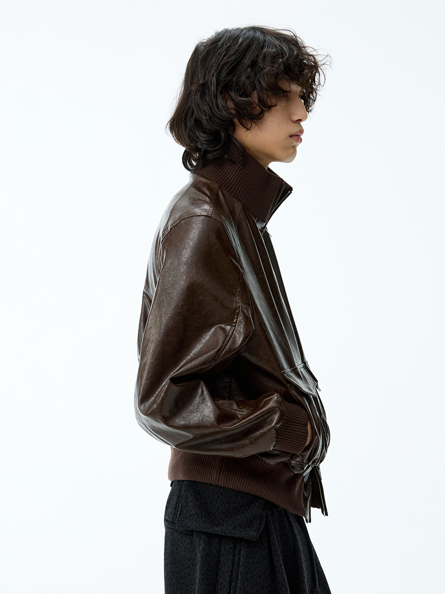 SMOCKED HEM OILED LEATHER JACKET