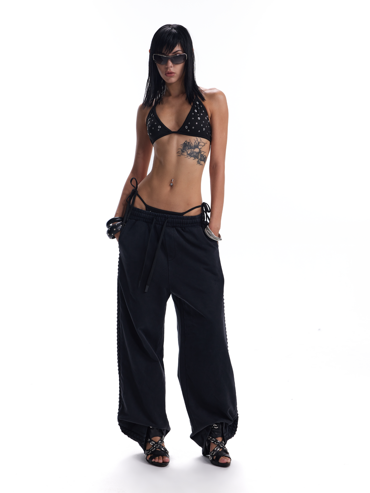 DISTRESSED RIVET BAGGY SWEATPANTS