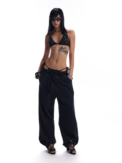 DISTRESSED RIVET BAGGY SWEATPANTS