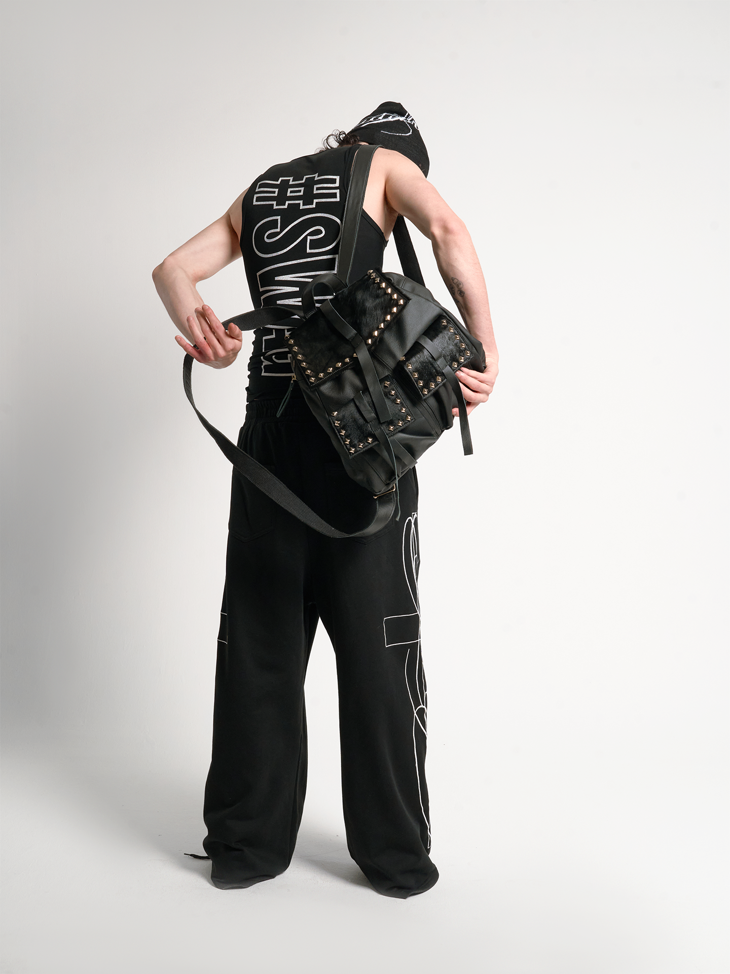 STUDDED HORSEHAIR LEATHER BACKPACK