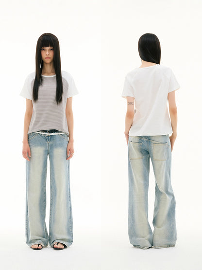 SLANT BREASTED LOW RISE JEANS