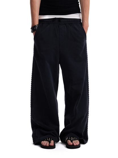DISTRESSED RIVET BAGGY SWEATPANTS