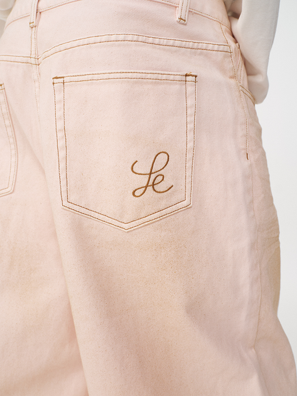STAINED PINK DENIM PANTS
